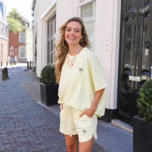 Palm tree two piece jogging set geel
