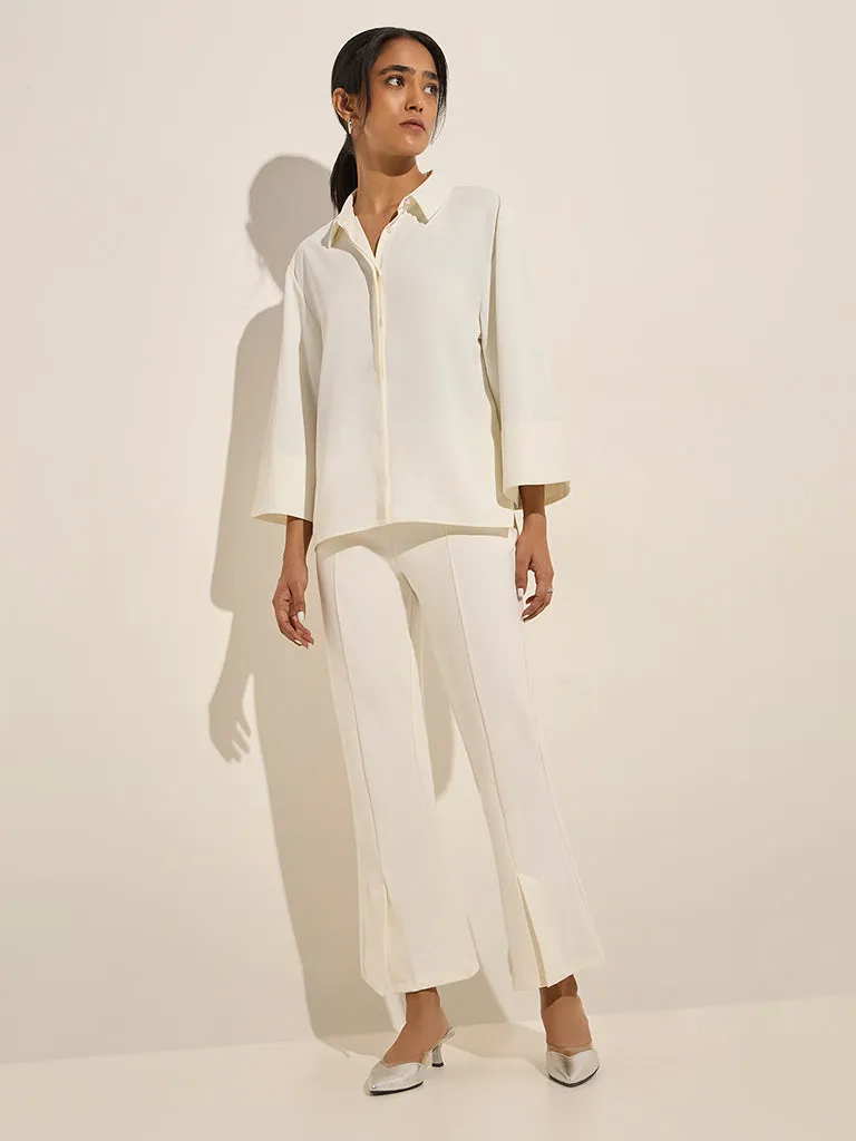 Wardrobe Off-White Slit-Detailed High-Rise Bootcut Trousers
